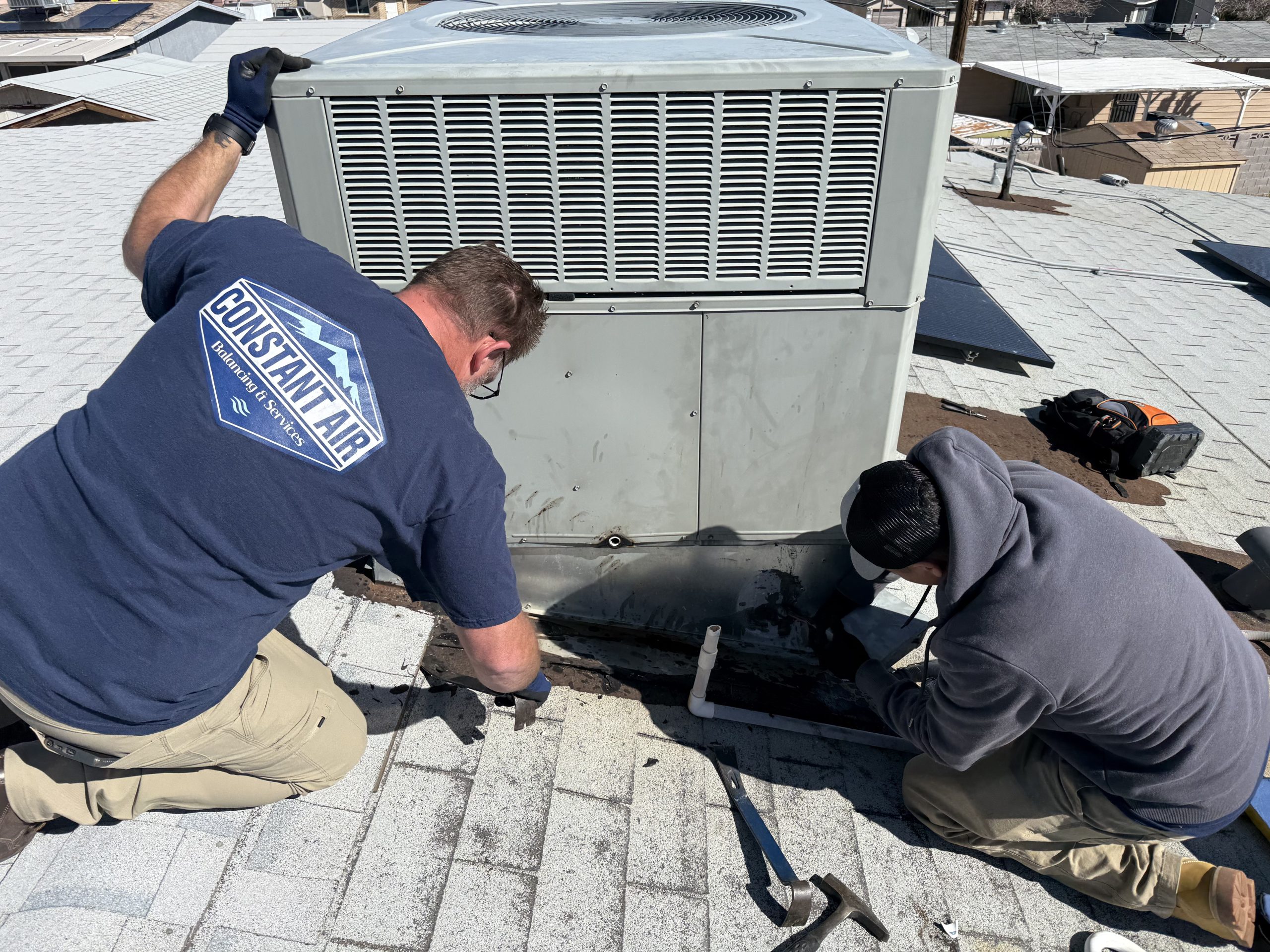 Constant Air Balancing technicians installing HVAC system in Las Vegas