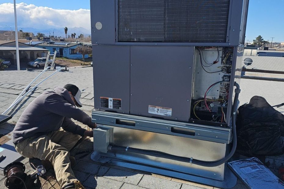 Constant Air Balancing technician working on a new commercial rooftop HVAC installation in Las Vegas, NV